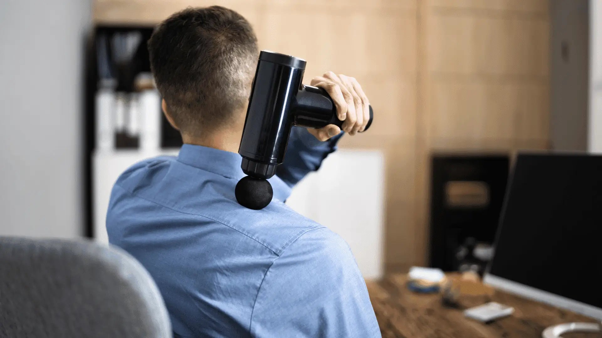 Black massage gun for relieving pinched nerve pain with massage guns therapy