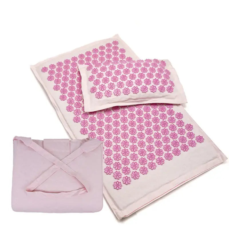 Pink floral-accented acupressure mat and pillow set in candy pink