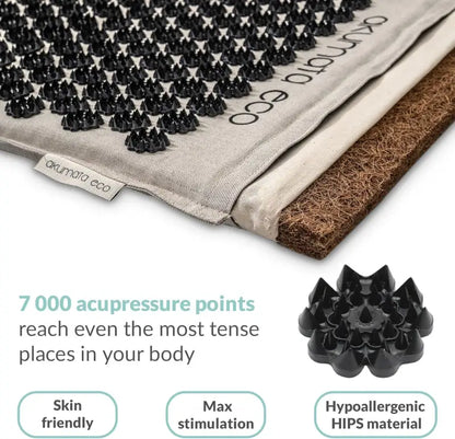 Black acupressure mat Akumata ECO with 7000 spike points on beige linen cover