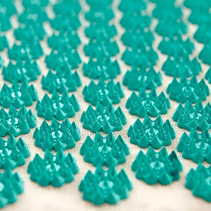 Teal green acupressure mat Akumata ECO with tree-shaped spikes