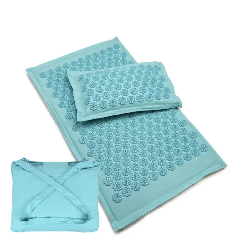 Light blue acupressure mat set with pillow and bag